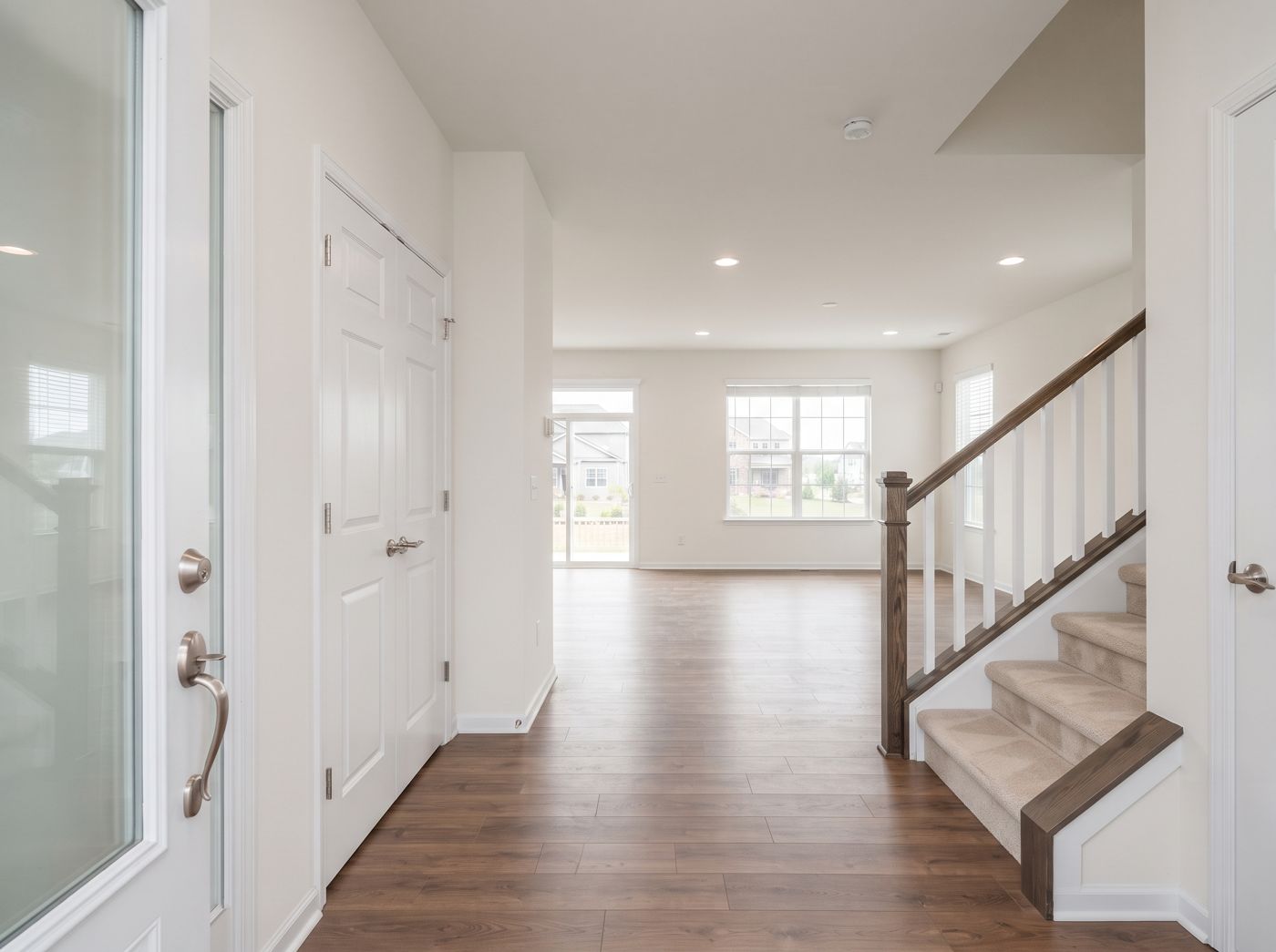 Entry with staircase immediately right of the front door